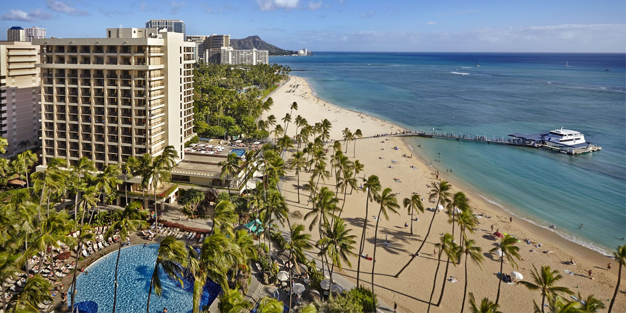 Beachfront view of the Alii Tower with Super Pool in foreground, beach and ocean