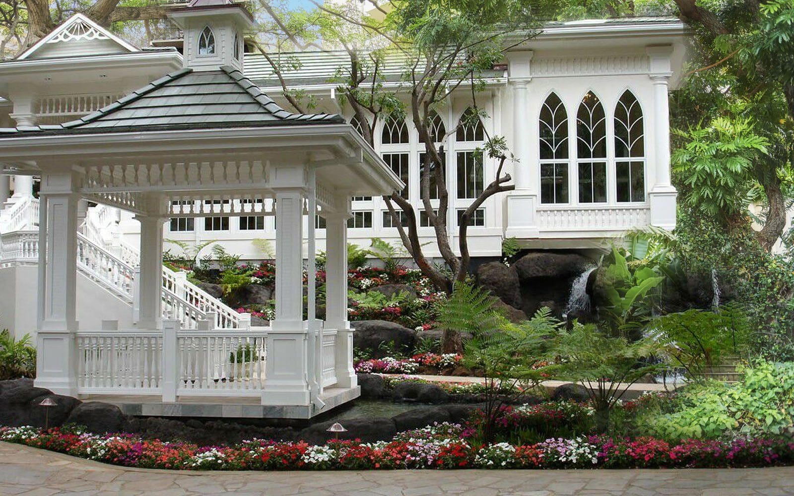 White wedding chapel and gazebo in a beautiful tropical setting