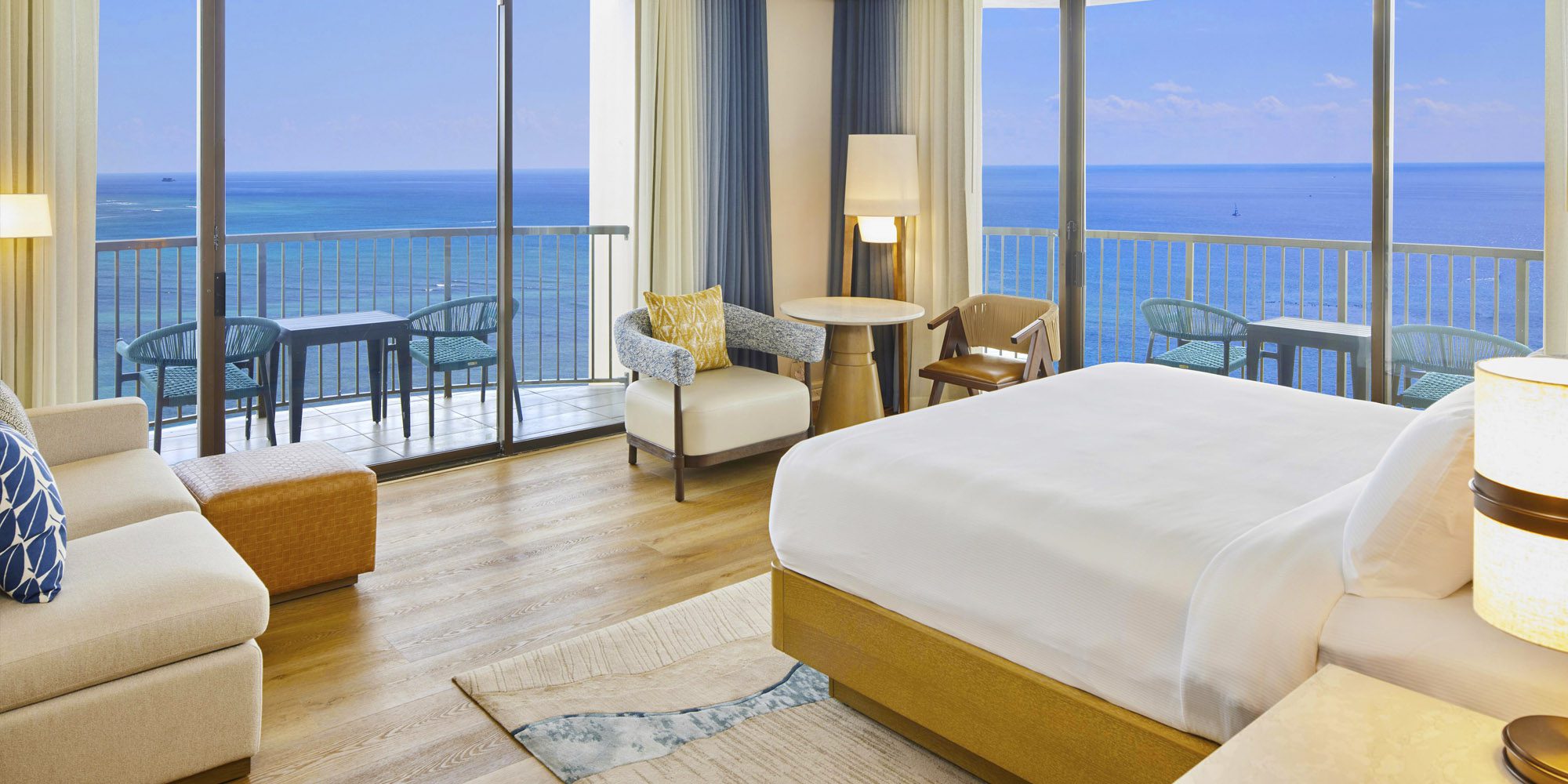 Rainbow Tower Corner Ocean Room with two large balcony sliding doors looking out to the ocean.