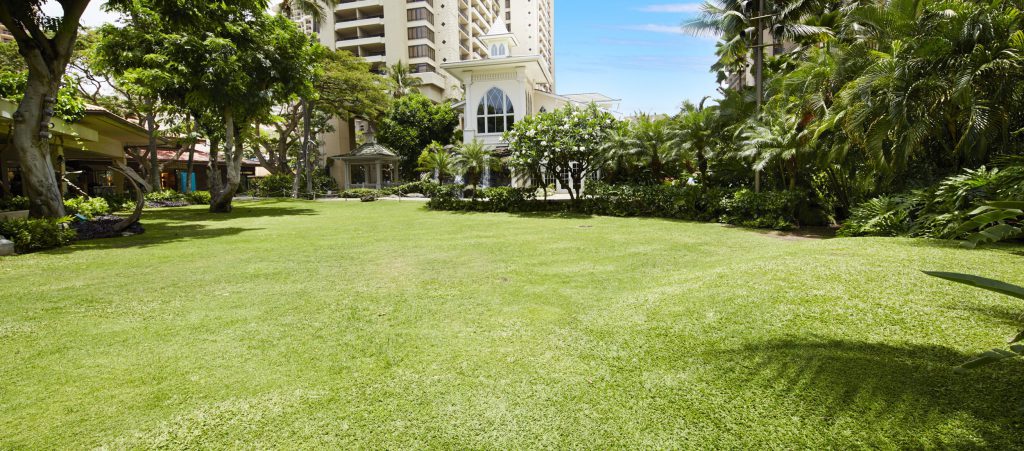 The Village Green with the Akala Chapel in the background