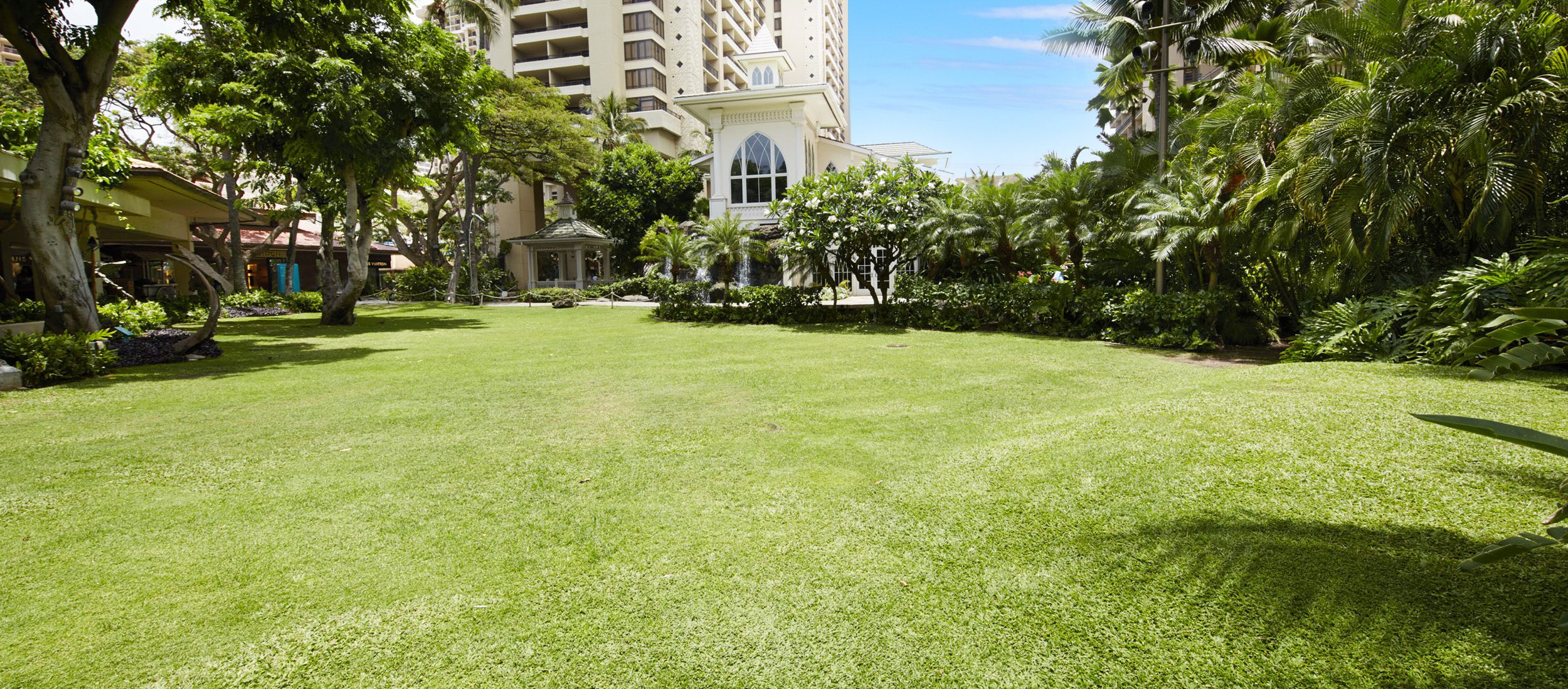 The Village Green with the Akala Chapel in the background