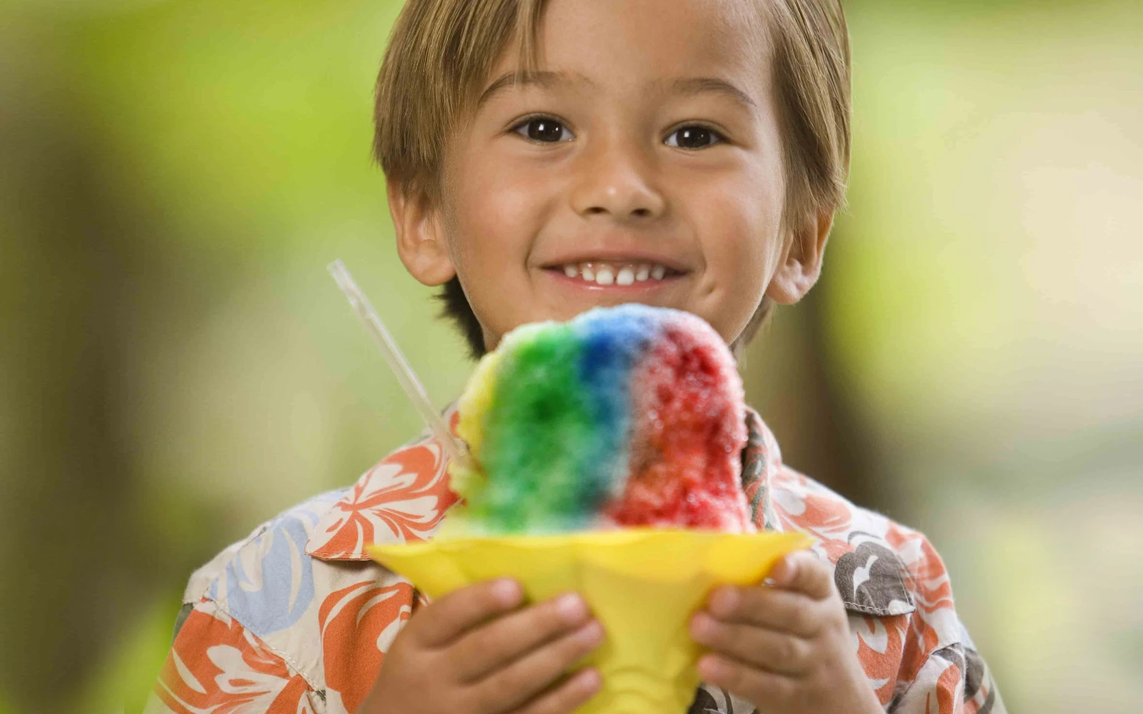 A child eating an ice cream cone from Wiki Wiki Market