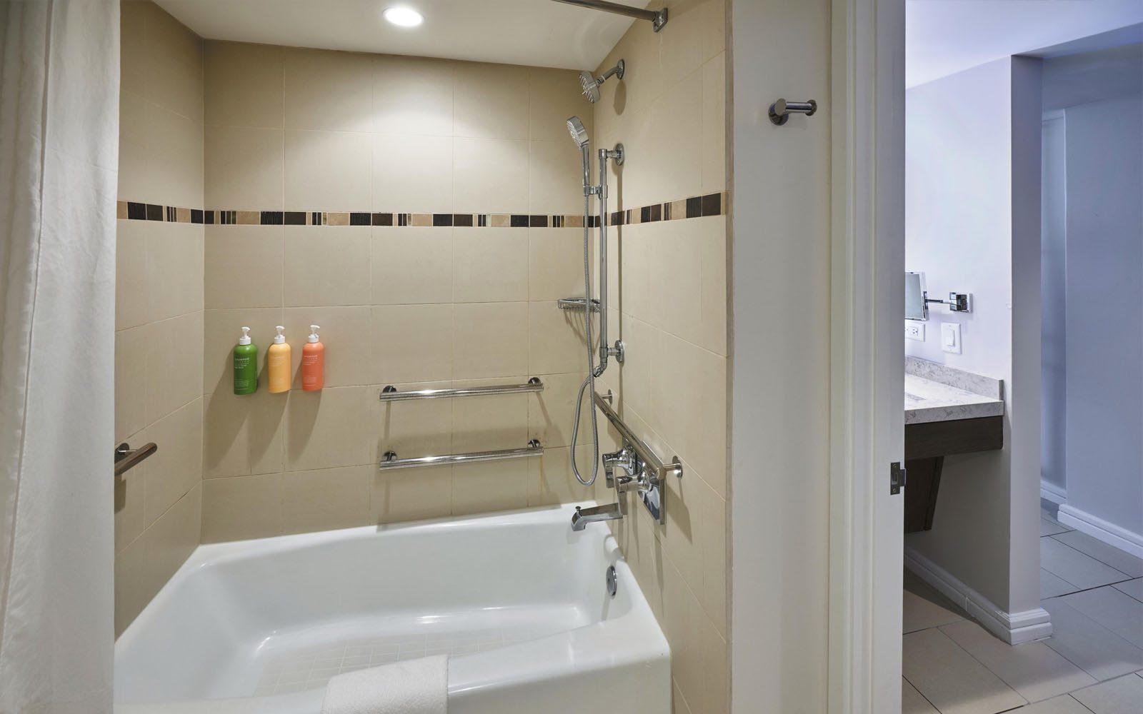 Accessible Tub with grab bars in Rainbow Tower accessible room
