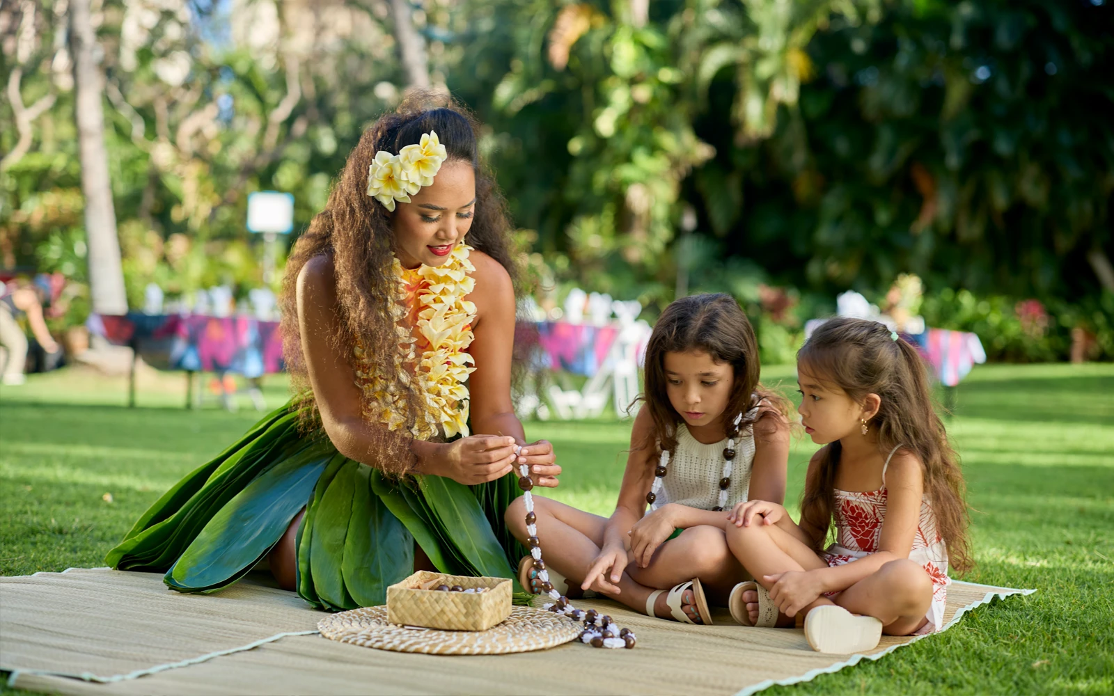Children making leis at the Hilton Hawaiian Village