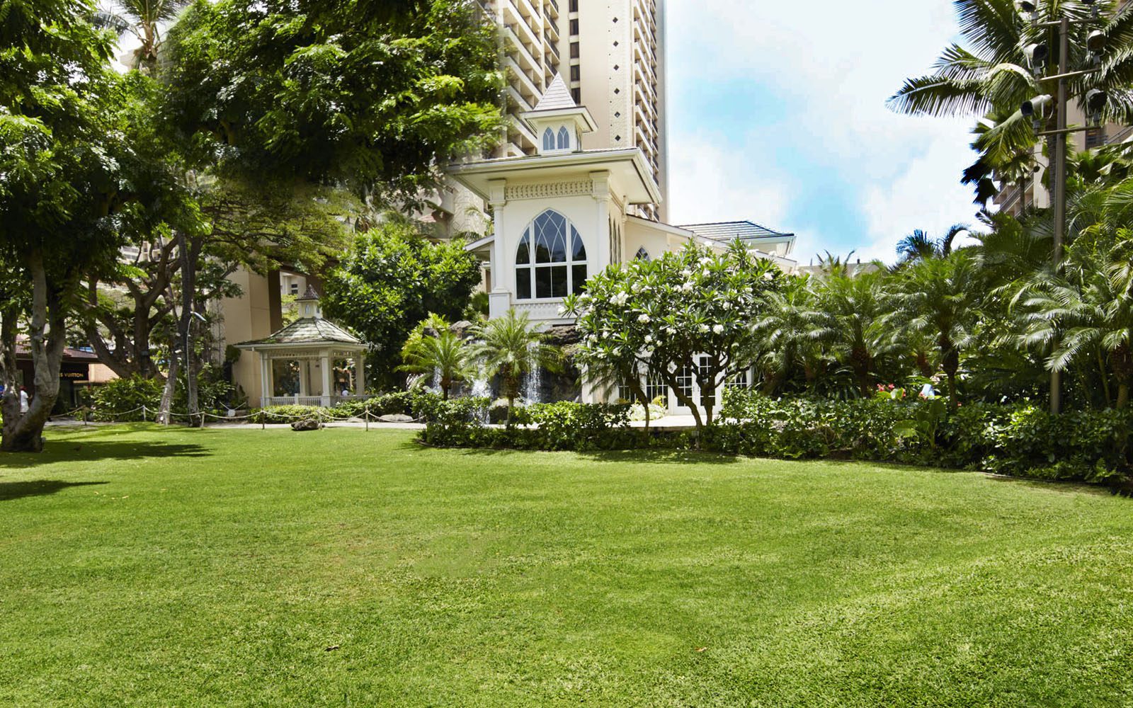 The Village Green with the Akala Chapel in the background