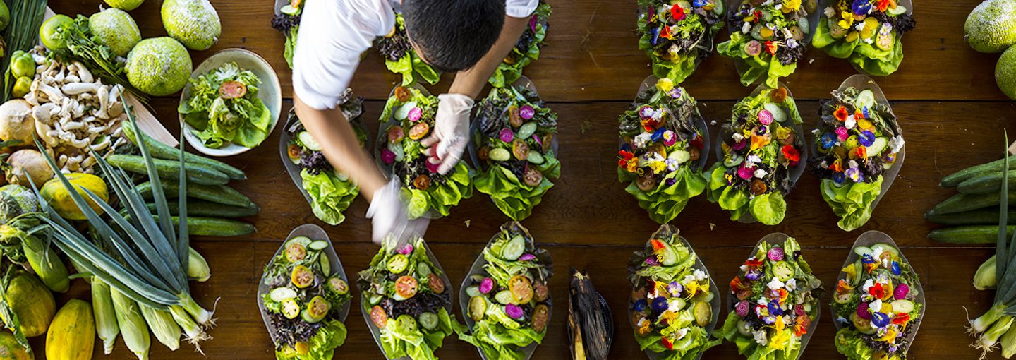 Catering chef preparing salads for an event